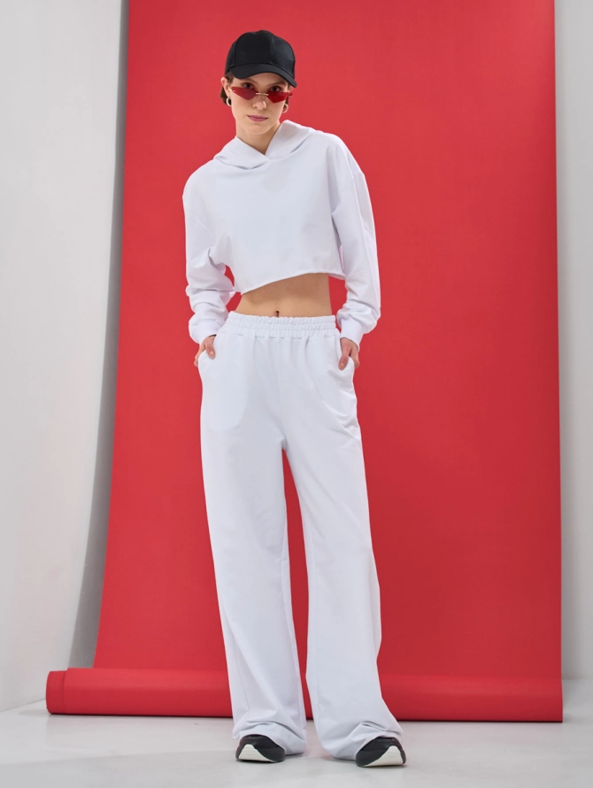 Брюки-клеш из футера с необработанным краем