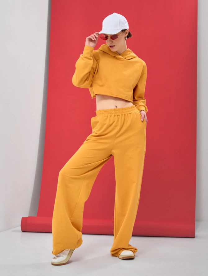 Брюки спортивные клеш из футера горчичные