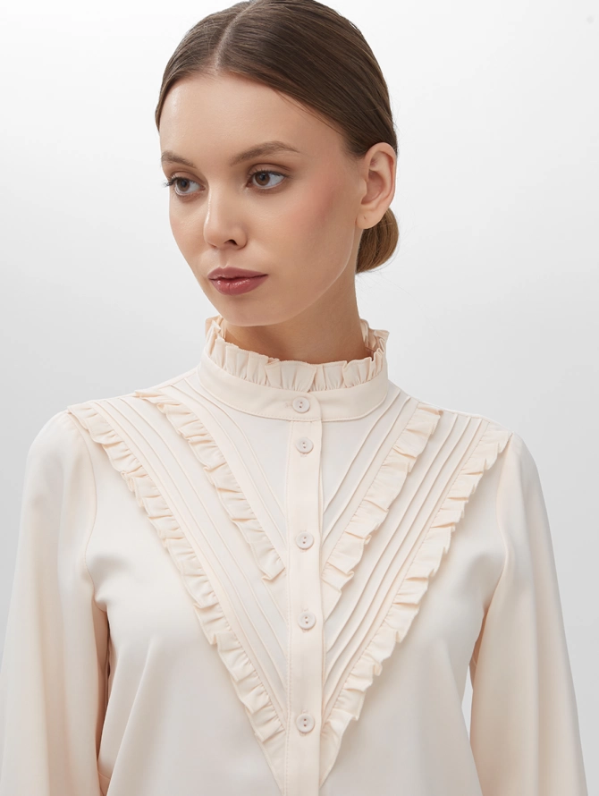 Блузка с рюшами персик