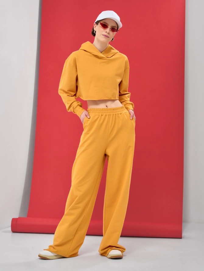 Брюки спортивные клеш из футера горчичные